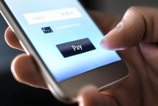 App payment with wallet app. Man paying and shopping with smartphone application. Digital money transfer, banking and saving money through apps in 2022.